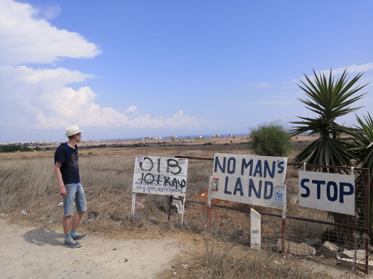 No Man's Land and Stop signs at the buffer zone fence