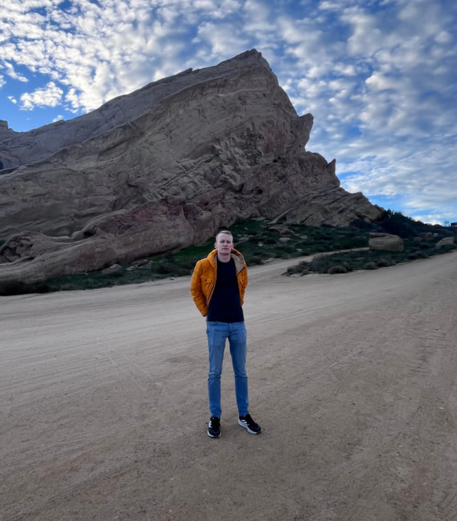 Standing in front of the tilted Vasquez Rocks